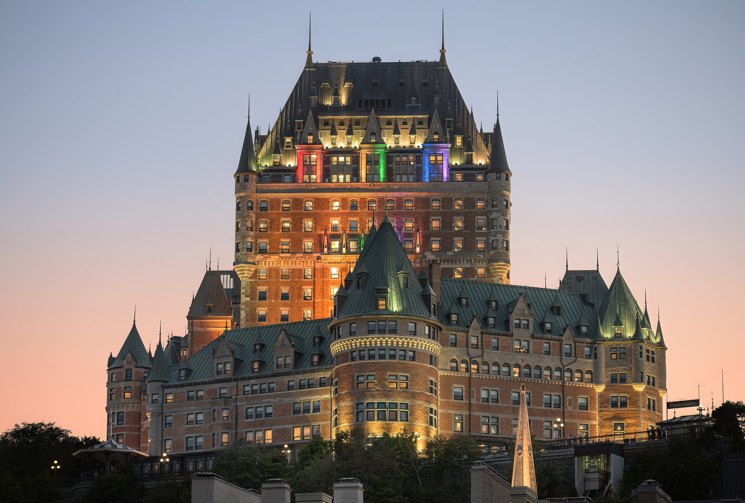 Château Frontenac lit at dusk above Old Québec